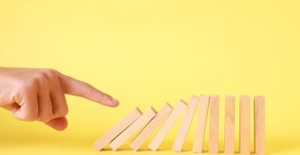 Nudging dominoes