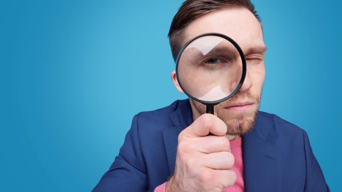 Man with magnifying glass