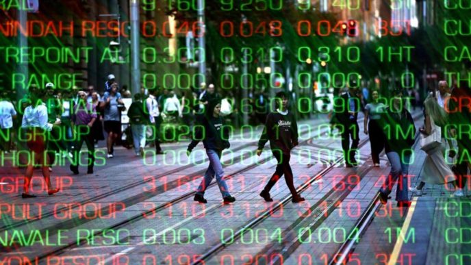 Australian shares edge higher despite Wall St sell