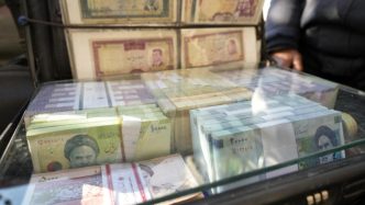 Iran's currency at record low as tensions run high