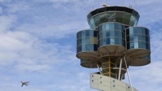 Passenger charged over alleged mid-air exit door