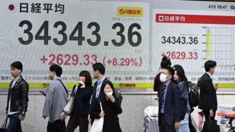 Stocks, dollar rebound in Asia as Trump steps back