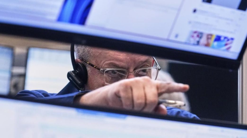 Wall Street ends whipsaw week higher