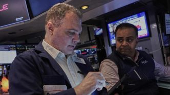 Wall Street slips after new US chip export curbs