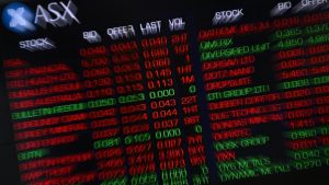 Australian shares beat jitters to finish month on