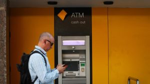 Commonwealth bank profit edges up amid business