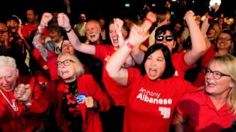 Labor supporters celebrate in Sydney as the results come in