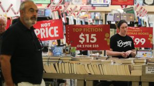 Spending falls below estimates, as holidays fail
