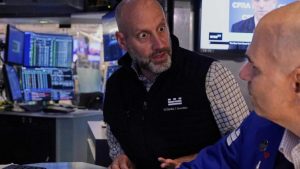 Wall St climbs on tariff optimism, strong US jobs