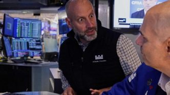 Wall St climbs on tariff optimism, strong US jobs