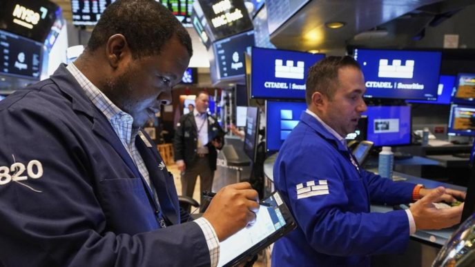 Wall St edges up as US-UK trade deal stokes