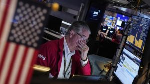 Wall St lower amid tariff tension ahead of Fed