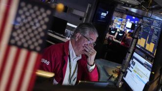 Wall St lower amid tariff tension ahead of Fed