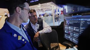 Wall Street edges lower as trade truce rally ebbs