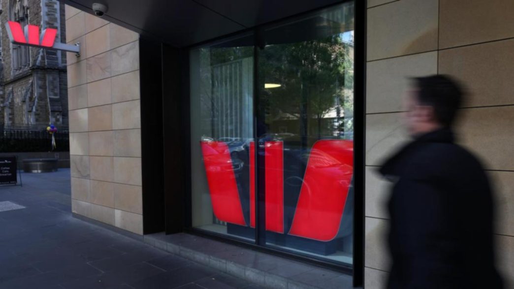 Westpac profit ticks lower, warns on global