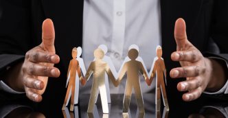 Hands either side of circle of family figures