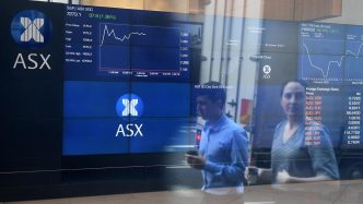 Australian shares nudge record before late-session