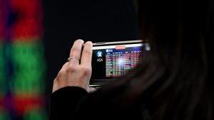 Australian shares retreat from highs for second