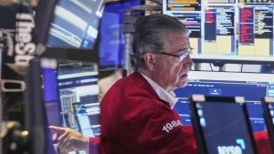 Chip stocks lift Wall St as investors await trade