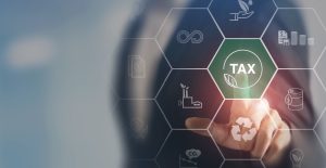 Finger pushes tax button