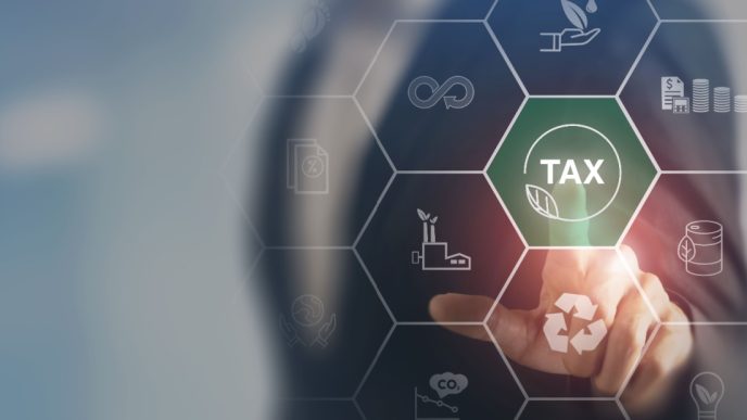 Finger pushes tax button