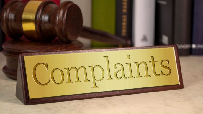Complaint sign and gavel