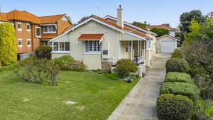 Perth property: Elderly woman celebrates after her