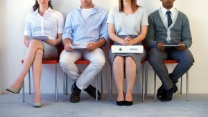 Unemployment rate nudges lower amid a record high